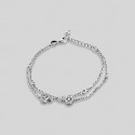 Srebrna zapestnica okrašena s cirkoniji