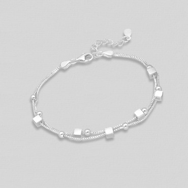 Srebrna zapestnica s kroglicami in kockami